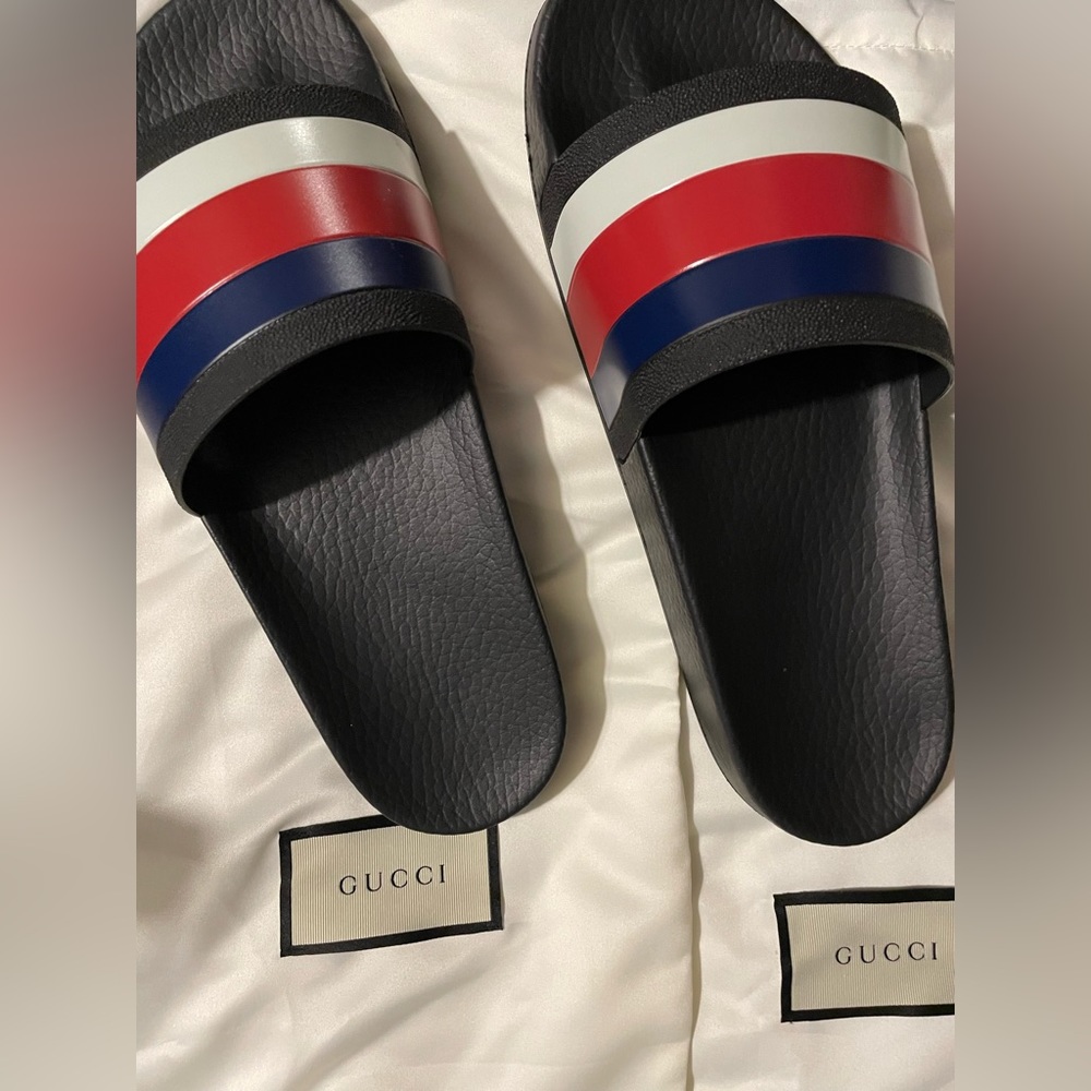 Mens Gucci slides.